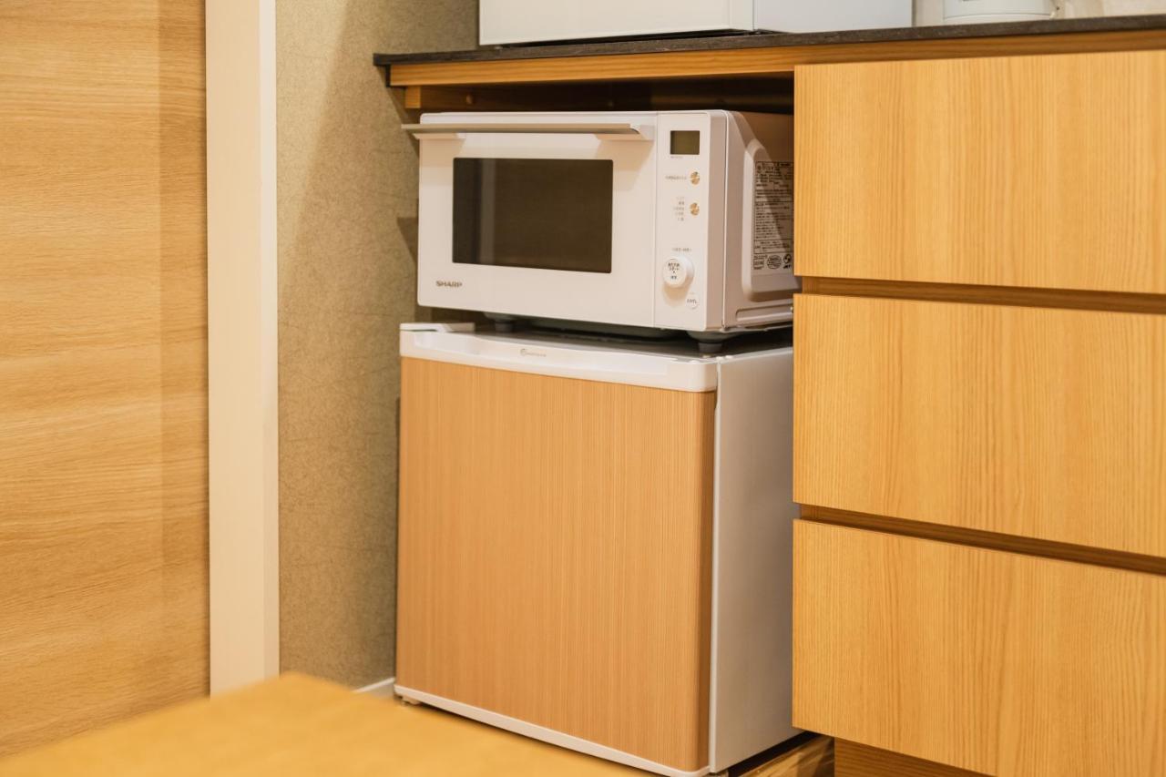 Aparthotel Grand Base Hakatamon Fukuoka  Esterno foto